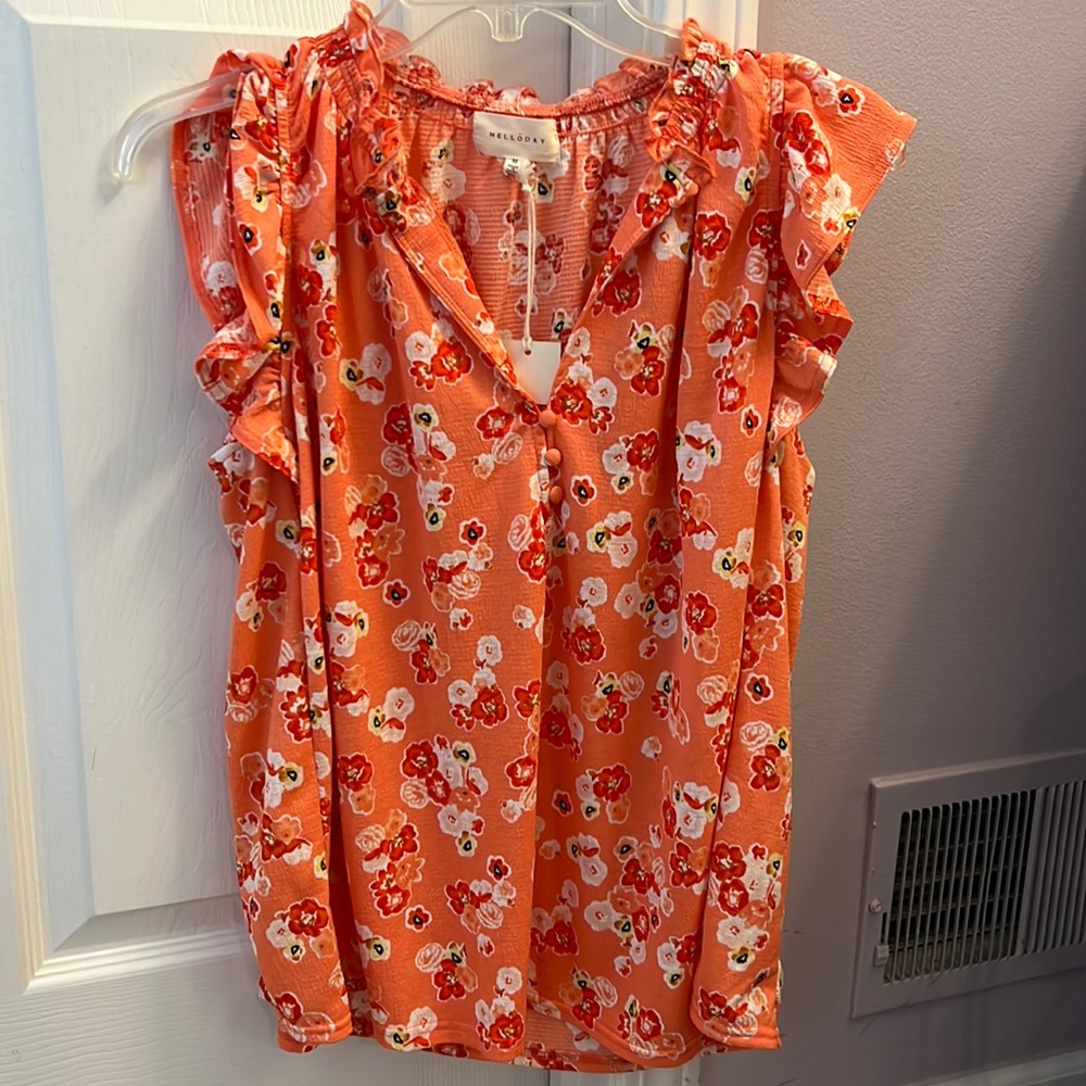 Floral Cap Sleeve shirt by Melloda